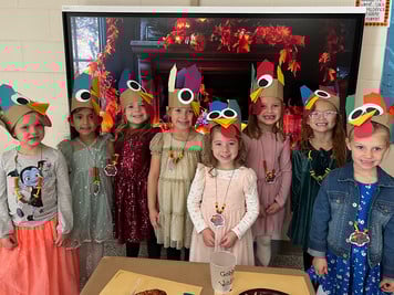 students with turkey hats