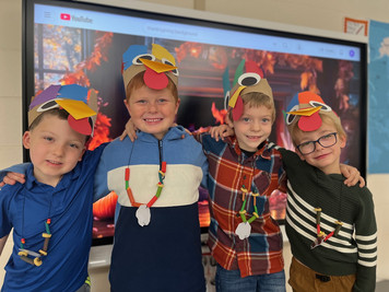 students with turkey hats